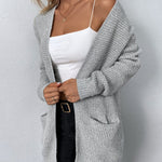 Long gray knit cardigan with open front and two patch pockets, long sleeves