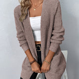Mauve long knit cardigan with open front, ribbed cuffs, and two patch pockets