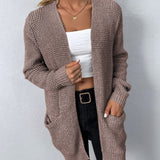 Mauve knit cardigan with open front and two patch pockets, long sleeves