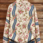 Women’s rib-knit zip jacket back view with climbing rose floral and blue panel print