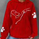 Women’s red pullover hoodie with hood and pouch pocket, dog graphic, paw-print sleeves