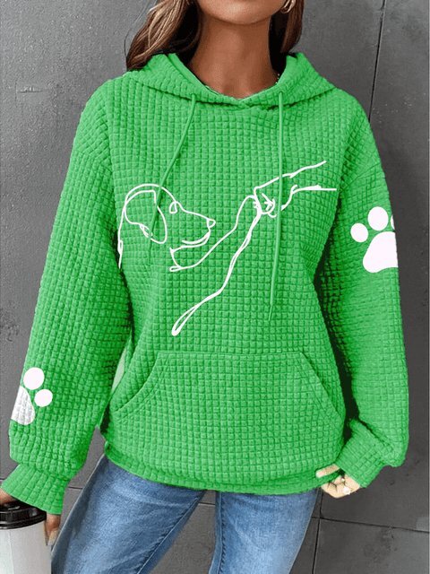 Women’s green pullover hoodie with hood and pouch pocket, dog graphic, paw-print sleeves