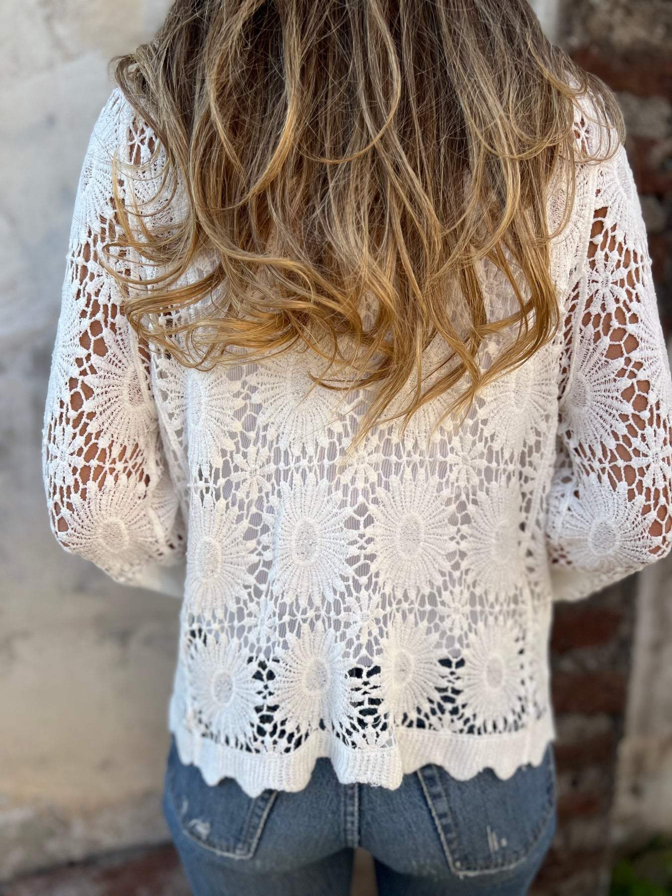 White lace cardigan back with open floral crochet and long sleeves