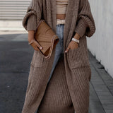 Taupe brown long knit cardigan with open front, long sleeves, and side pockets