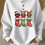 White vintage Christmas henley sweater with dog motif and festive stockings graphic
