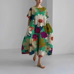 Women's floral dress, cream base with colorful big flower and leaf print, midi length
