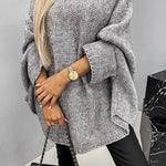 Women’s round-neck knit sweater, medium gray, long sleeves with relaxed cuffs