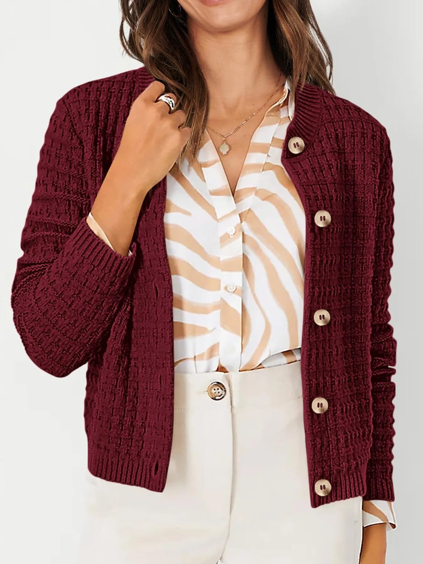 Womens knit cardigan with button front, burgundy textured knit and long sleeves