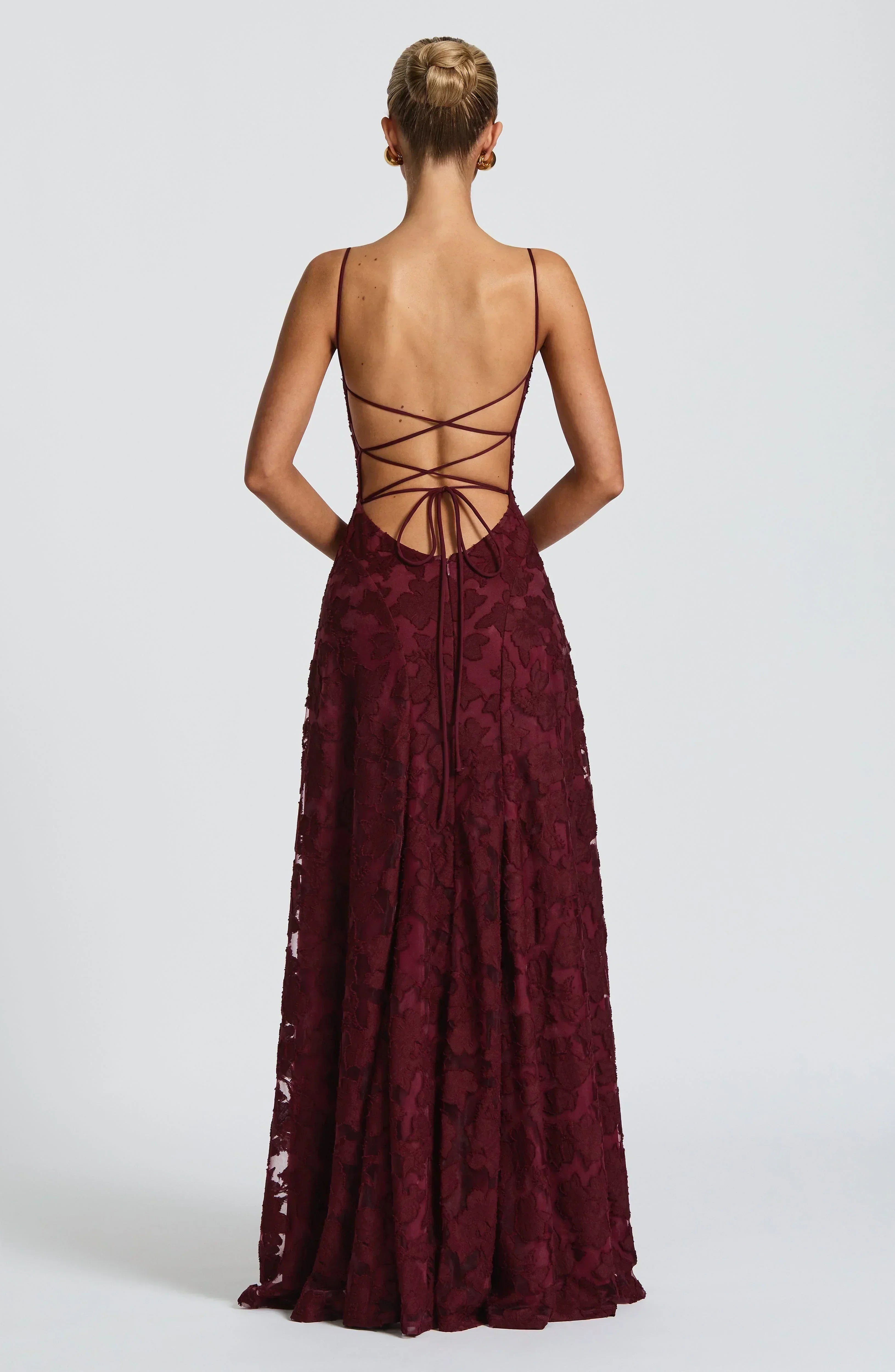 Backless burgundy lace maxi dress with crisscross spaghetti straps at the back