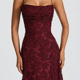 Burgundy lace maxi dress with spaghetti straps and fitted ruched corset-style bodice