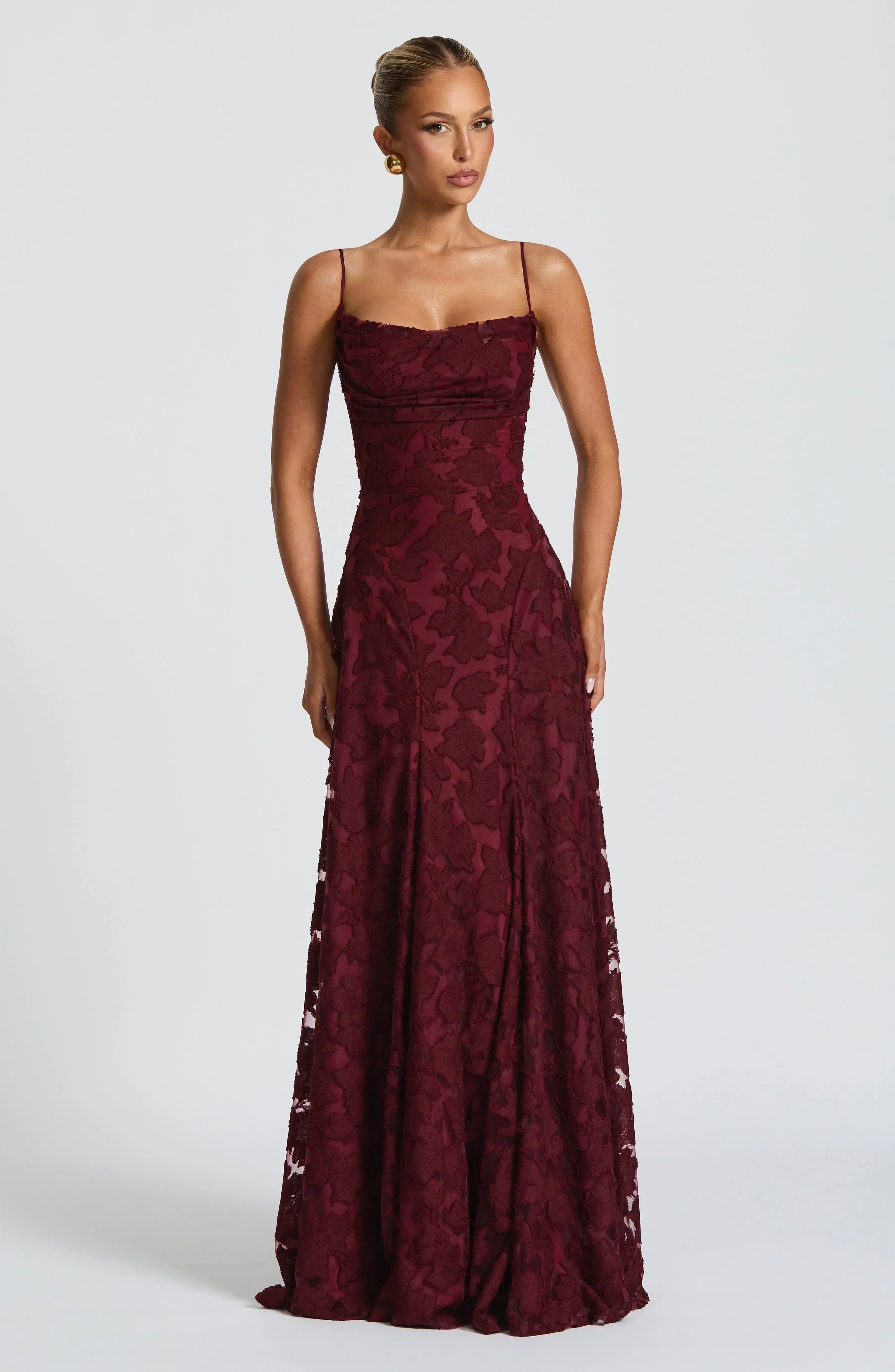 Burgundy lace maxi dress with spaghetti straps and sweetheart neckline, ruched bodice
