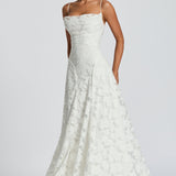 Ivory lace maxi dress with spaghetti straps and flowing flared skirt