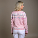 Pink knit cardigan with diamond pattern across back, button front and ribbed cuffs