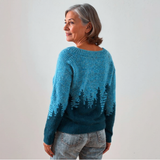 Turquoise sweater back with dark tree motif, crew neck, long sleeves