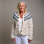 Cream knit cardigan with blue fair isle yoke, brown buttons, ribbed trim