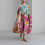 Women's floral dress in multicolor abstract flower print, midi length with short sleeves