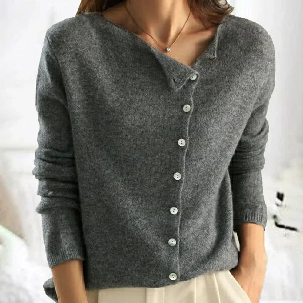 Gray knit cardigan with V-neck, button front, and long sleeves