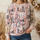 Women's botanical print pullover close-up, crew neck and long sleeves, pastel tones