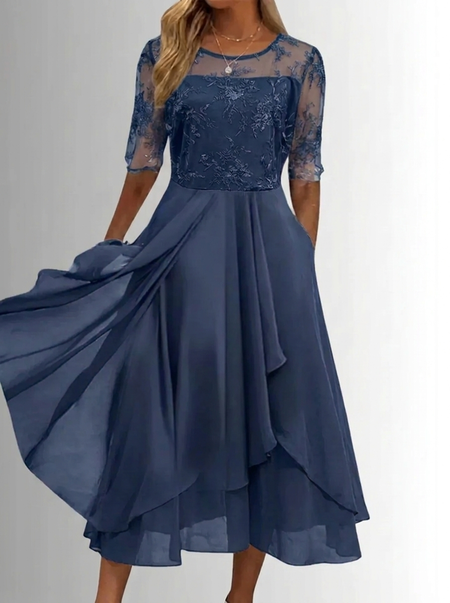 Navy lace dress with embroidered lace sleeves and layered ruffle midi skirt, flowing hem