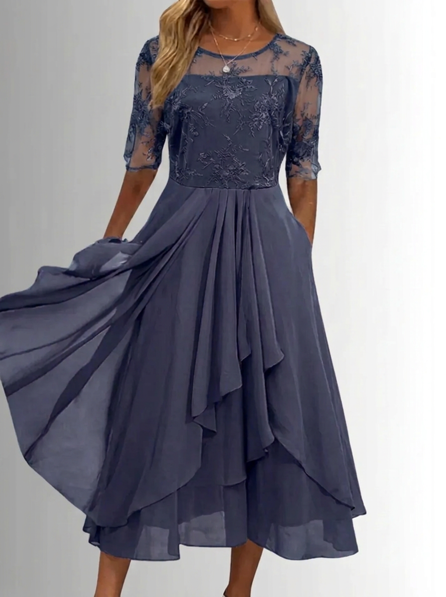 Navy lace dress with three-quarter sheer sleeves, floral bodice and ruffled tiered skirt