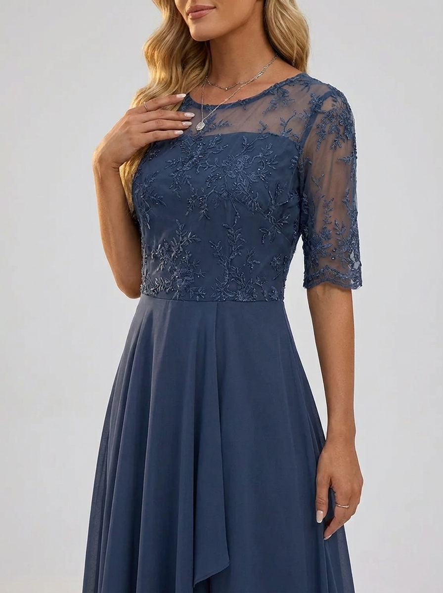 Navy lace dress with sheer sleeves and floral embroidered bodice, tiered midi skirt