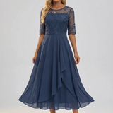 Navy lace dress with three-quarter sleeves and embroidered bodice, tiered skirt