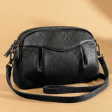 Finbjørg | Kleine und vielseitige Tasche in goldenem Cognac-Ton