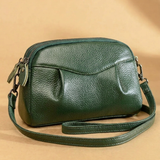Finbjørg | Kleine und vielseitige Tasche in goldenem Cognac-Ton