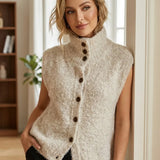 Sleeveless beige cardigan with mock neck, fuzzy knit and front buttons