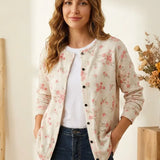Floral button cardigan in cream with pink rose print, long sleeves, black buttons