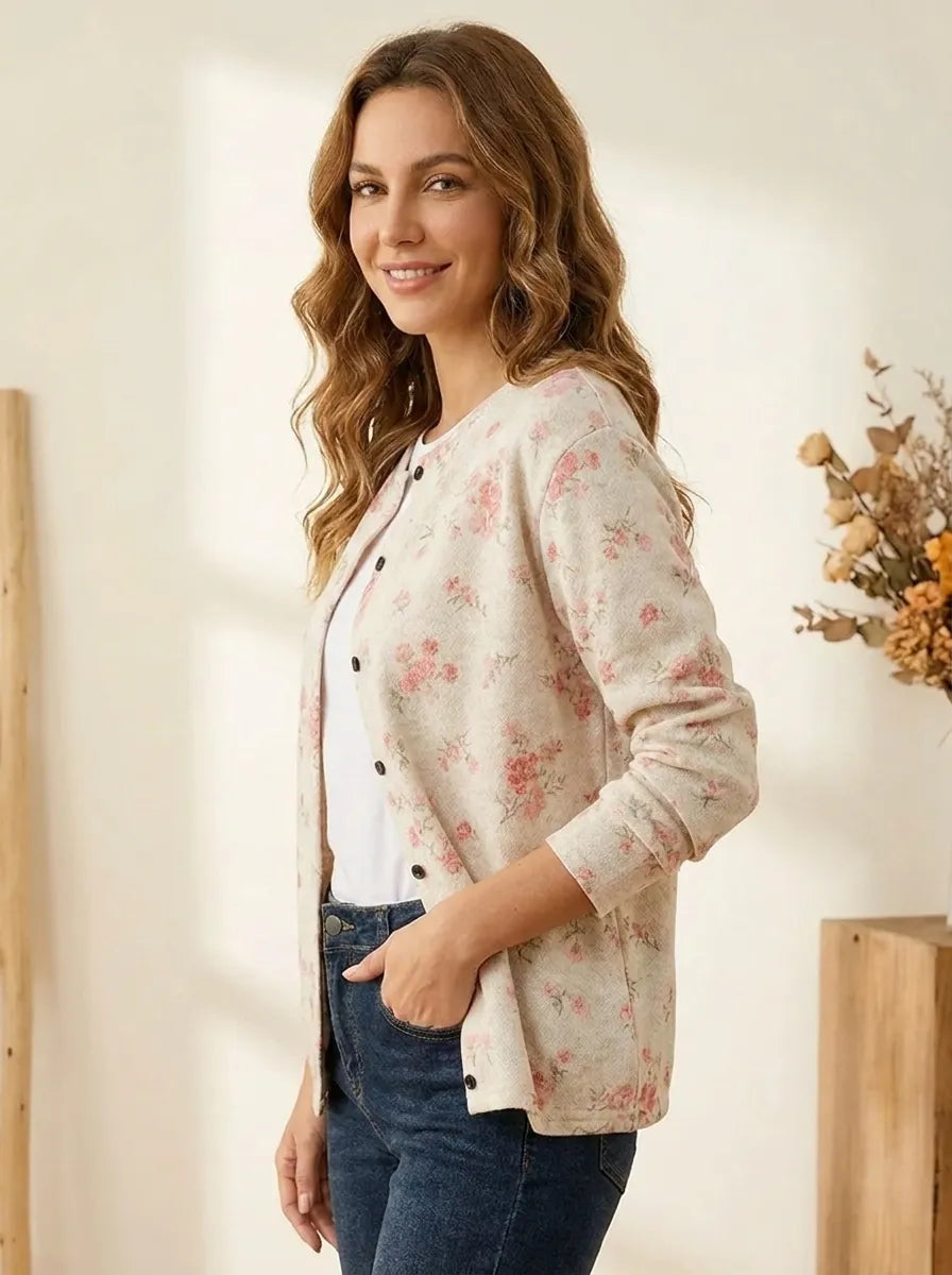 Cream floral button cardigan with pink rose print, side view, long sleeves, black buttons