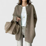 Light brown fuzzy button-front cardigan jacket with long sleeves and side pockets