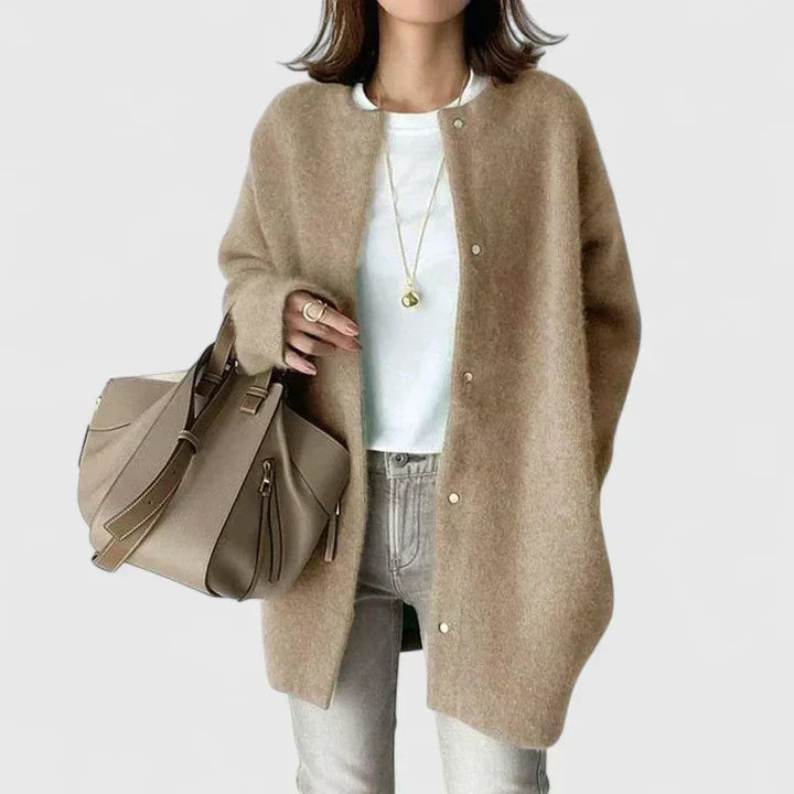 Beige fuzzy button-front cardigan jacket with long sleeves and side pockets