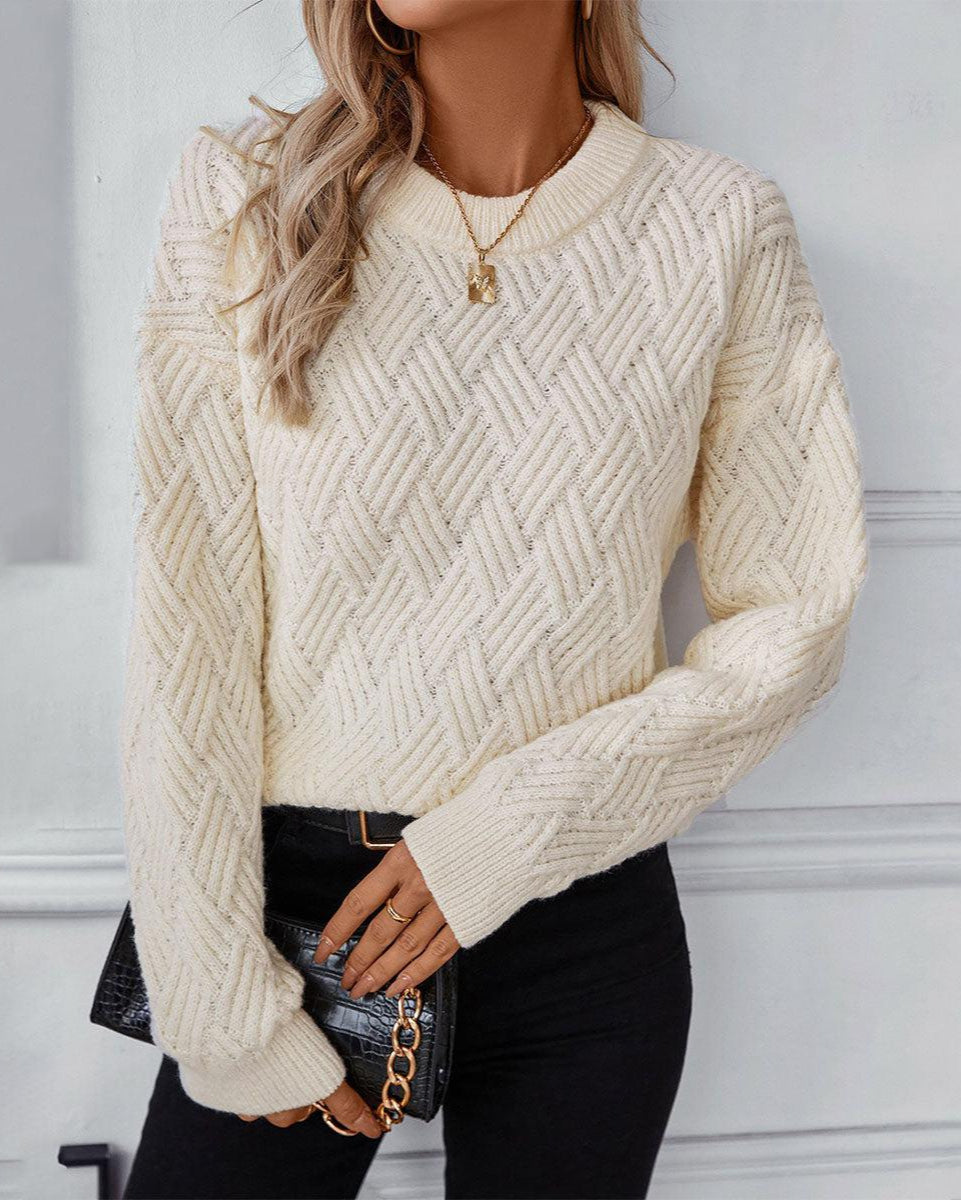 Cream chevron cable knit sweater with crew neck and ribbed cuffs