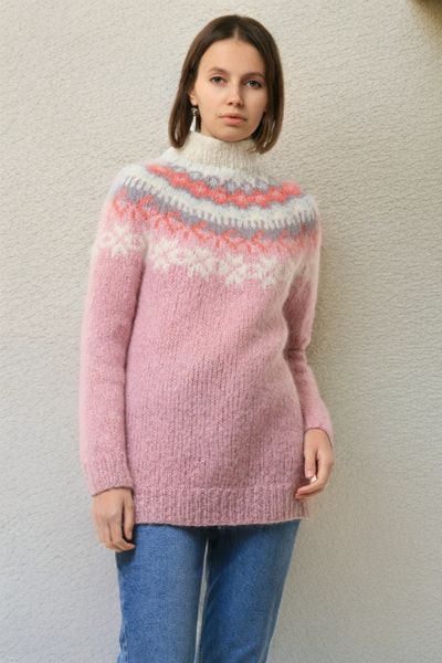 Light pink knit sweater with orange and white fair isle zigzag yoke