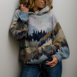 Gray hoodie with kangaroo pocket, drawstring hood, blue forest mountain landscape