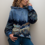 Blue graphic hoodie with kangaroo pocket and drawstring hood, landscape pattern