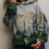 Gray hoodie with kangaroo pocket, drawstring hood, green forest mountain print