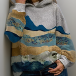 Gray hoodie with kangaroo pocket and drawstring hood, blue desert mountain landscape print