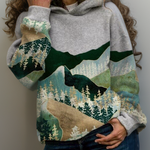 Gray hoodie with kangaroo pocket and drawstring hood, green and tan landscape graphic