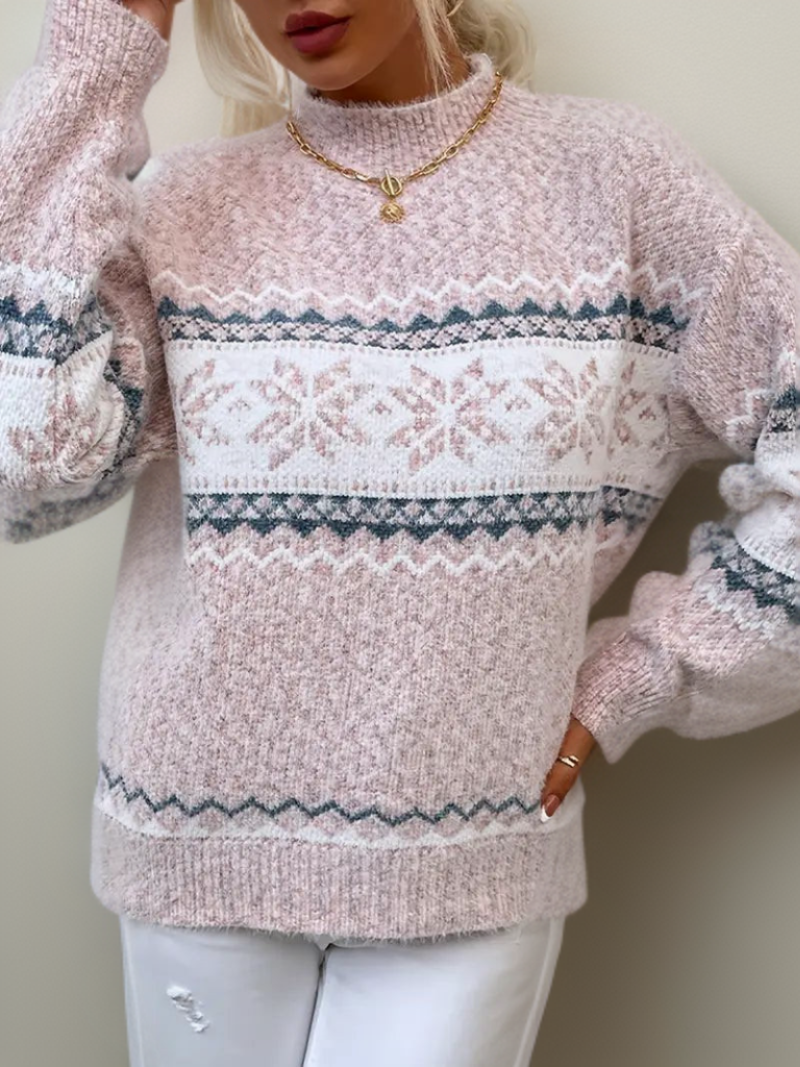 Light pink knit sweater with white fair isle band and snowflake motifs, crew neck, long sleeves
