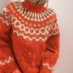 Cozy orange fair isle turtleneck sweater, ribbed collar and long sleeves