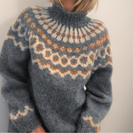 Cozy gray fair isle turtleneck sweater with blue patterned yoke, long sleeves