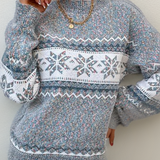 Blue knit sweater with white yoke and fair isle snowflake pattern, crew neck, long sleeves