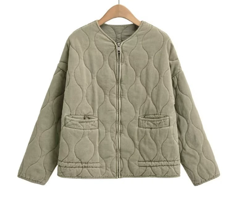 Olive cropped quilted jacket with full zip, flap pockets, and drawstring hem