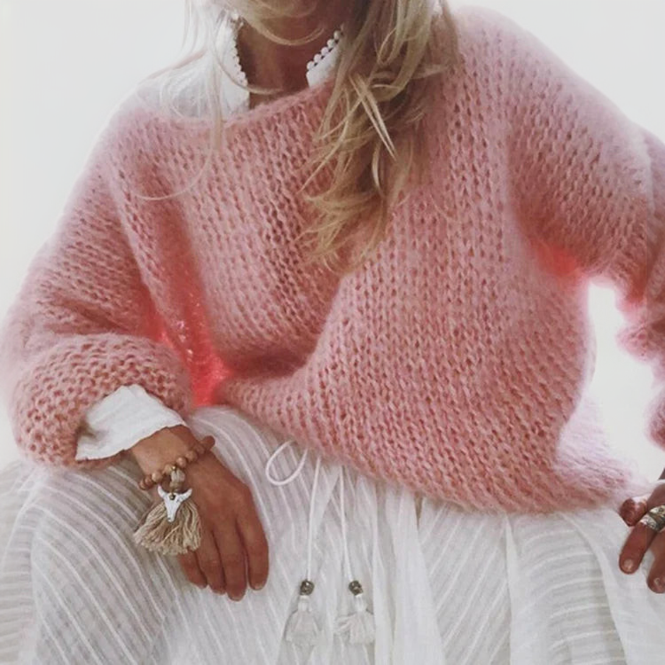 Dusty pink textured knit sweater with wide sleeves and round neckline
