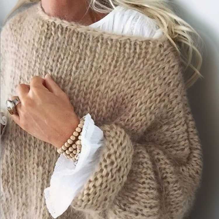 Beige textured knit sweater with wide neckline and long sleeves