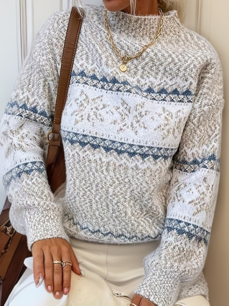 Cream knit sweater with blue and white fair isle stripe band, crew neck, long sleeves