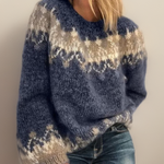 Women’s jacquard knit sweater with blue and cream fair isle pattern, round neckline