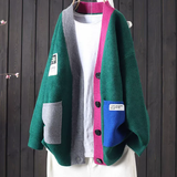 Liane™ color-block cardigan in green with pink button placket and side patch pockets